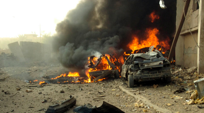 A spate of bombings in two Syrian regime stronghold cities killed at least 100 people and wounded 120 on Monday