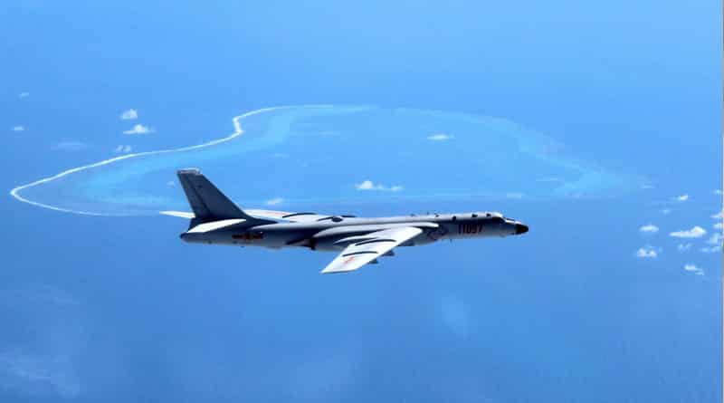 Chinese warning crackled on the radio of United States Navy plane
