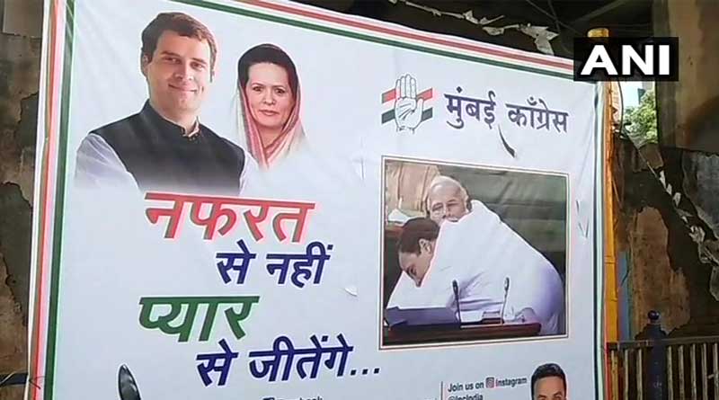 Ahead of Amit Shah's Visit, Congress puts up poster of Rahul Hugging PM Modi
