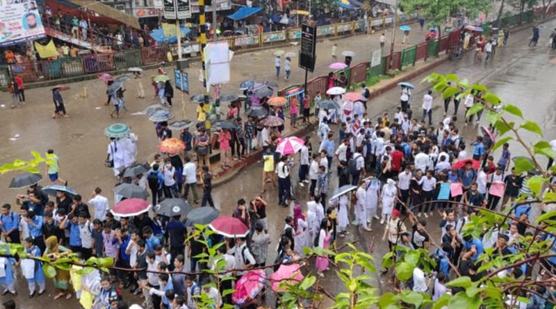 Dhaka: Students checking driving license in rain