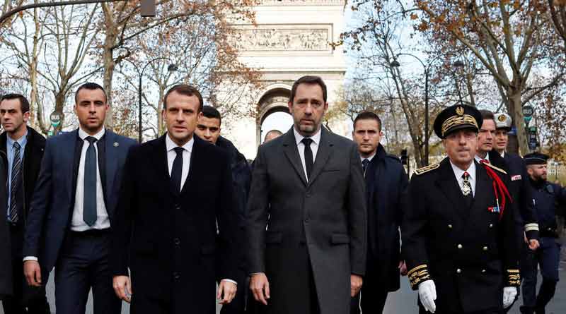 French President Emmanuel Macron visits riot-damaged Arc de Triomphe, state of emergency mulled