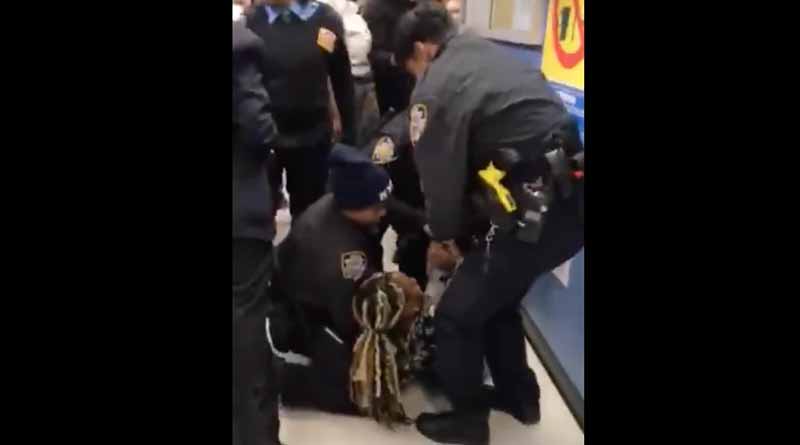Police ripping baby from his mother's arms