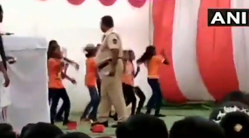 Cop showers cash on schoolgirls