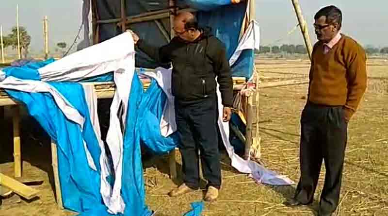 Group of people ransack stage  
