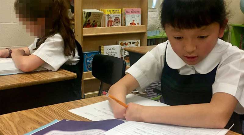 Girl born without hands wins handwriting competition