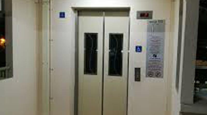 A woman trapped in a broken lift, drink urine to survive