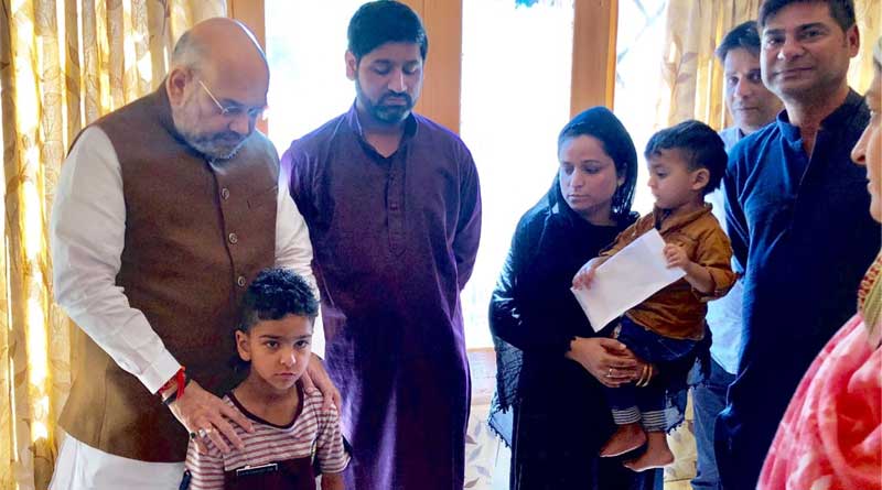 Home minister Amit Shah visits martyr cop's home in Kashmir