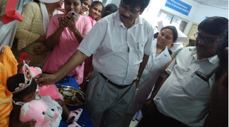 Abandoned child left alone, hospital authority organished her rice ceremony