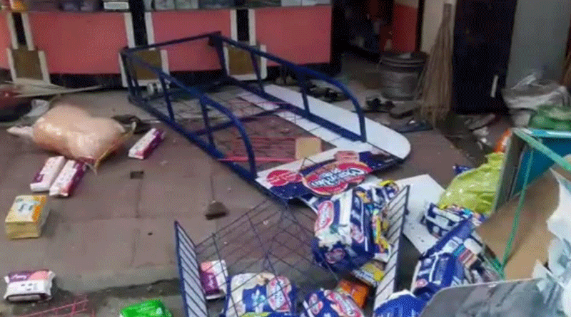 A cosmetic shop vandalised by mass in Raiganj area