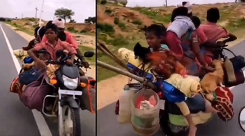 A man carrying his family of 7 people along with 2 dogs, video goes viral