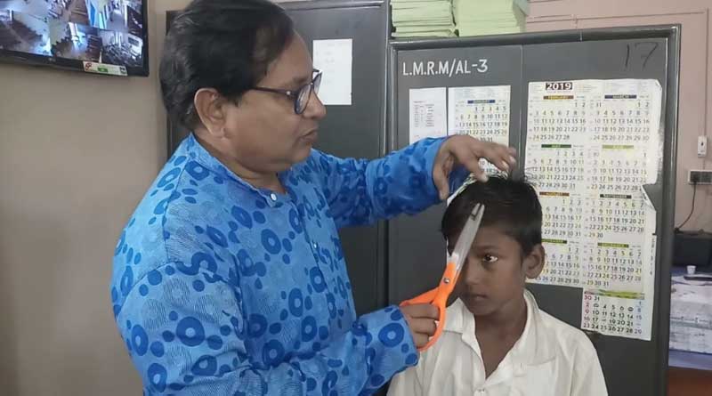Head Master of Lohapur MRM High School cuts students hair as punishment