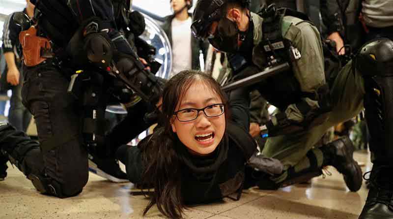 Hong Kong protests flare before Xi meeting with Lam