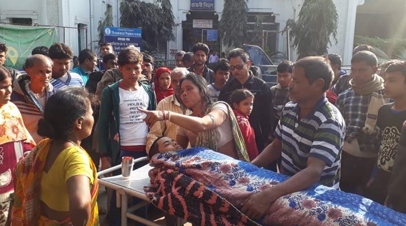 parents try to feeding milk their teenage boy after death