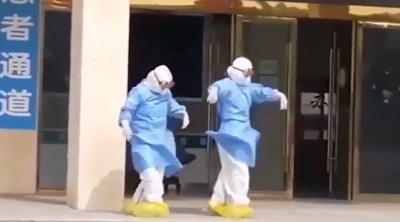 Medical attendants dancing to celebrate recovery of patient's coronavirus