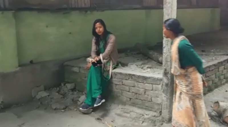 A woman stages protest infront of in-laws house in cooch behar