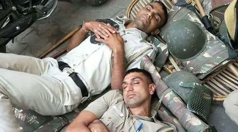 Cops sleeping on ground, pics viral on social media