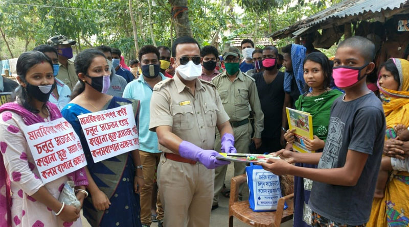 Some youth of bangaon serve notebook and pen to poor students