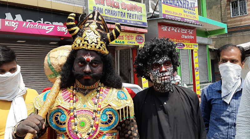 2 youth dressed up as yamraj and corona virus appeals people to stay at home