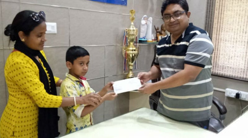 A 7-years-old child donate his savings in relief fund