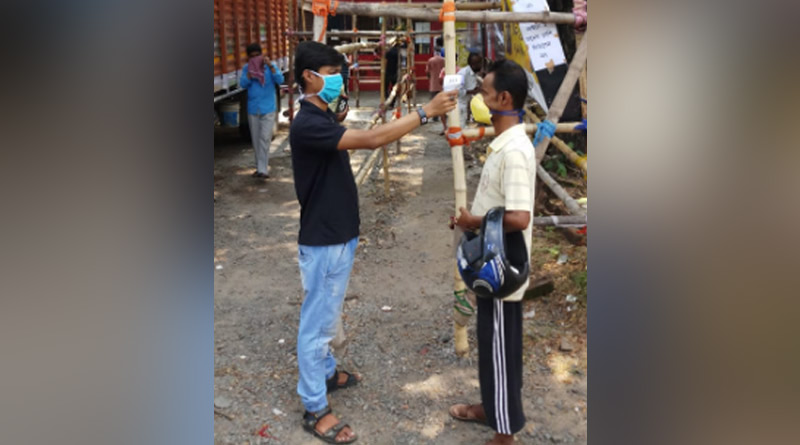 Madhyamgram wine shop did thermal screening of buyers to prevent corona