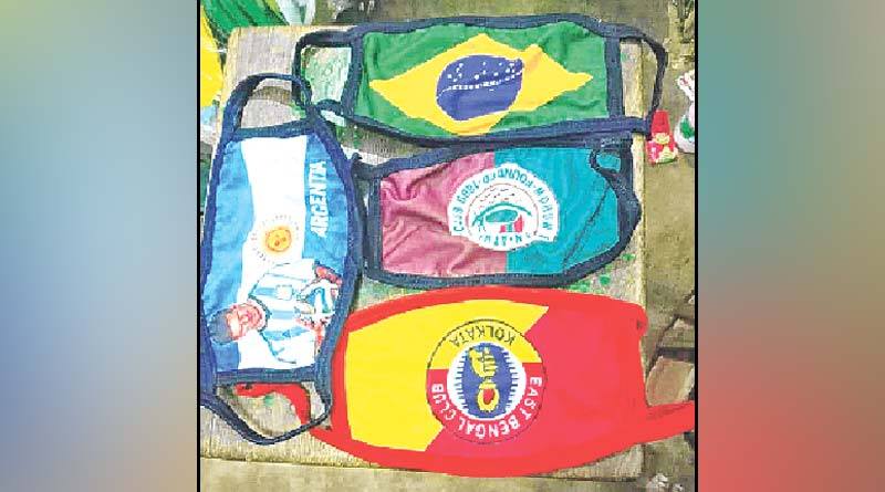 Masks featuring favorite clubs logo are a hit in Hawrah