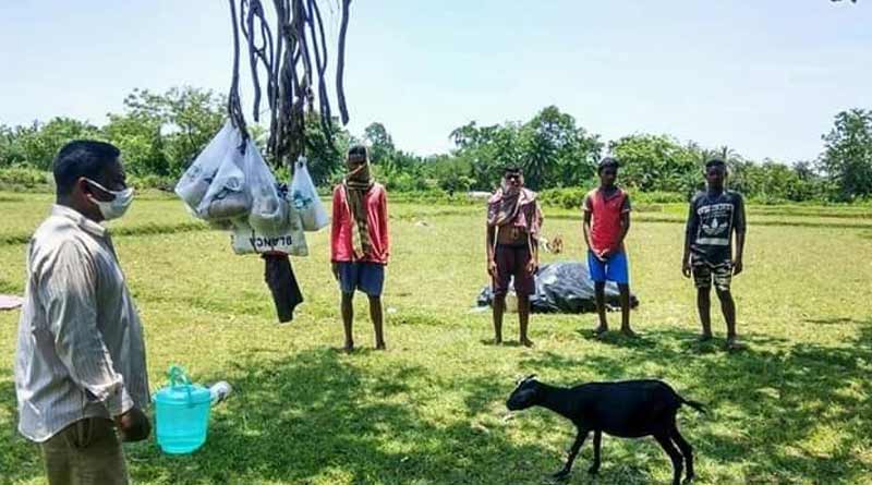 Seven migrant labour sheltered under a banyan tree in Jhargram