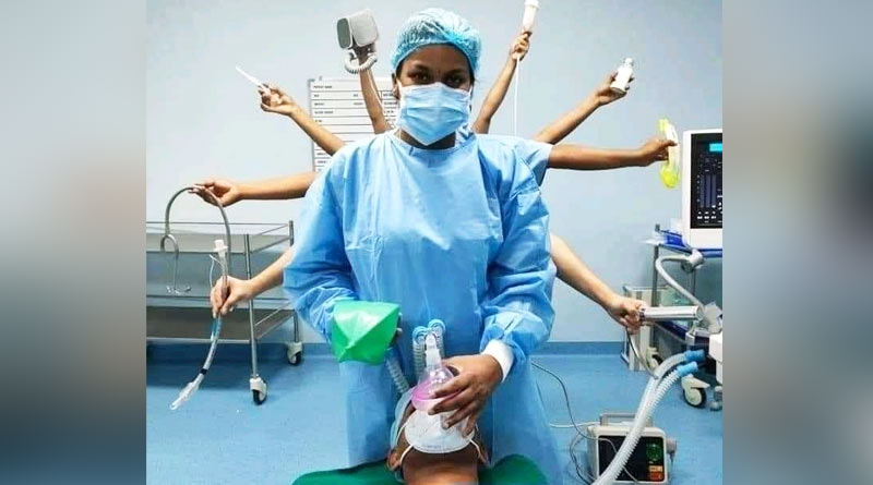 Photo of a Doctor in Durga Maa's avatar goes viral on social media | Sangbad Pratidin