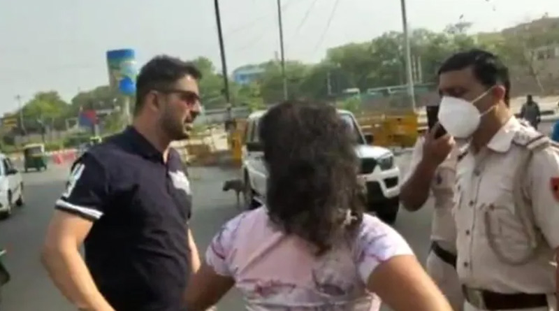 Stopped for no masks, Delhi couple abuses cops, video goes viral | Sangbad Pratidin