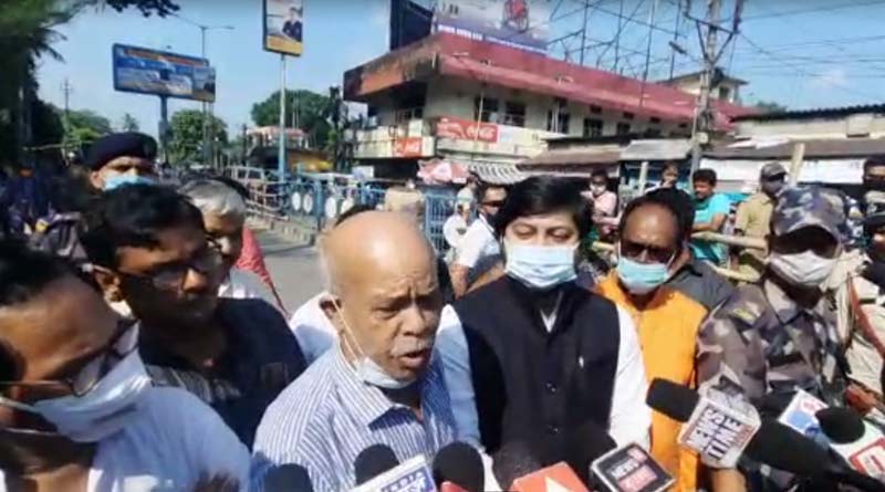 Some people agitates in front of Dinhata's BJP candidate । Sangbad Pratidin