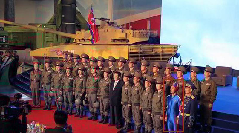 Pic of soldier wearing super-tight blue outfit while posing with Kim Jong-un goes viral। Sangbad Pratidin