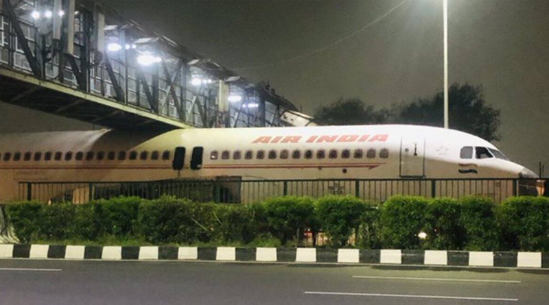 Air India plane gets stuck under foot bridge on Delhi-Gurugram highway | Sangbad Pratidin
