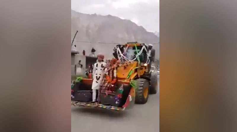 Pakistani Couple Says No To Cars, Takes A Ride In JCB Instead | Sangbad Pratidin