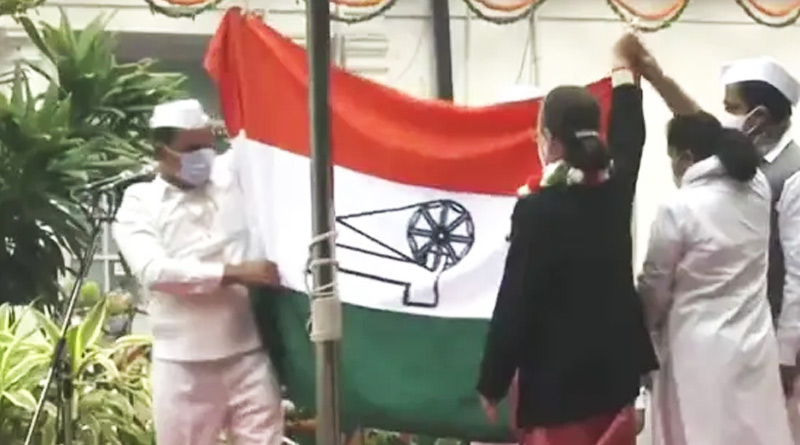 Congress flag falling down as Sonia Gandhi tries to unfurl it on party Foundation Day | Sangbad Pratidin