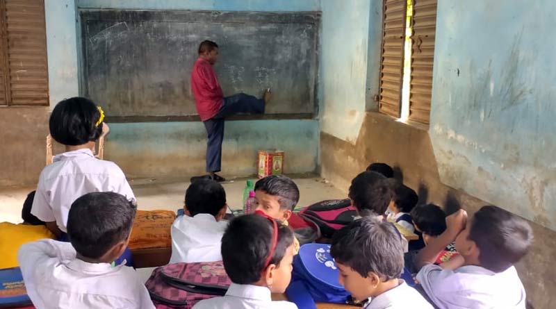 Bengal man beats disability, teaches in Katwa school । Sangbad Pratidin