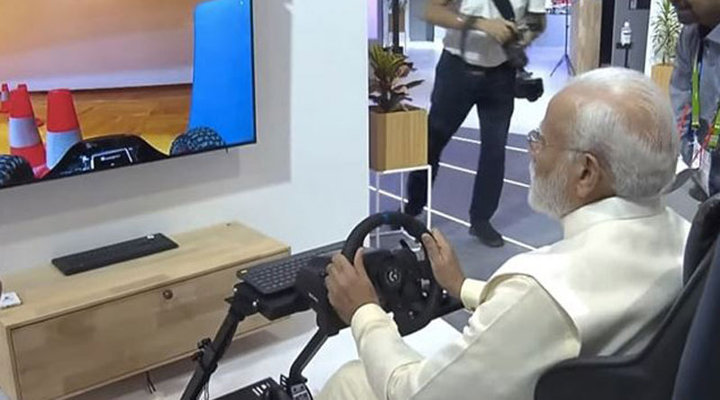PM Narendra Modi test-drove a car in Europe remotely from New Delhi। Sangbad Pratidin