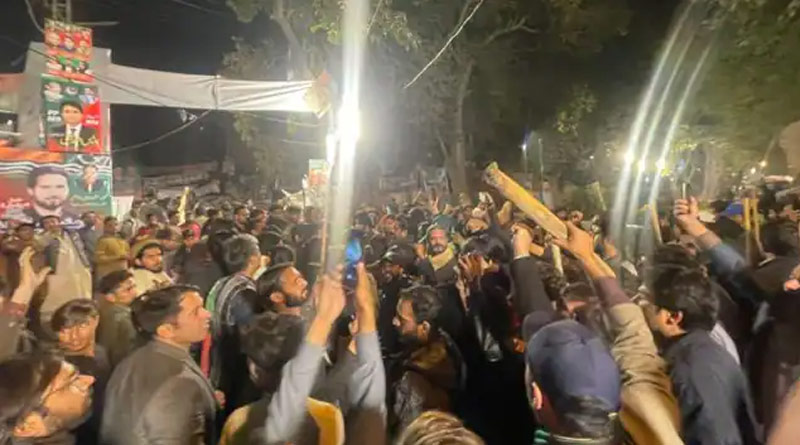 Hundreds of PTI workers and supporters camp outside Imran Khan’s Lahore home to thwart arrest bid। Sangbad Pratidin