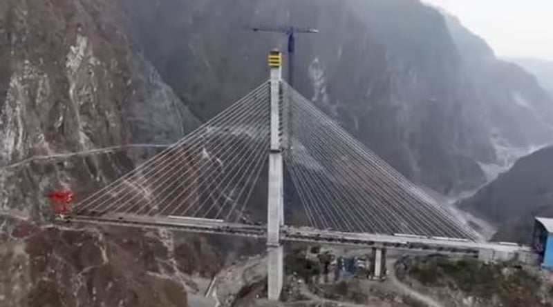 India's first cable-stayed rail bridge on Anji river in J-K near completion। Sangbad Pratidin