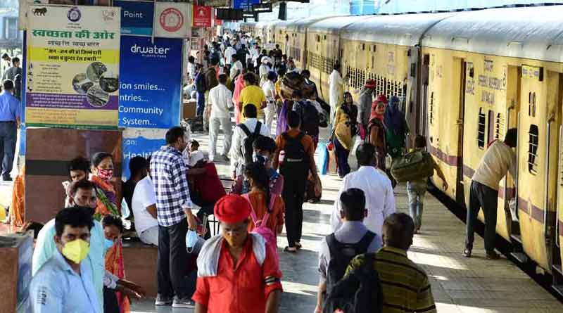 Hundreds of people blushing after an adult film played on the TV screens installed at Bihar’s Patna railway station । Sangbad Pratidin