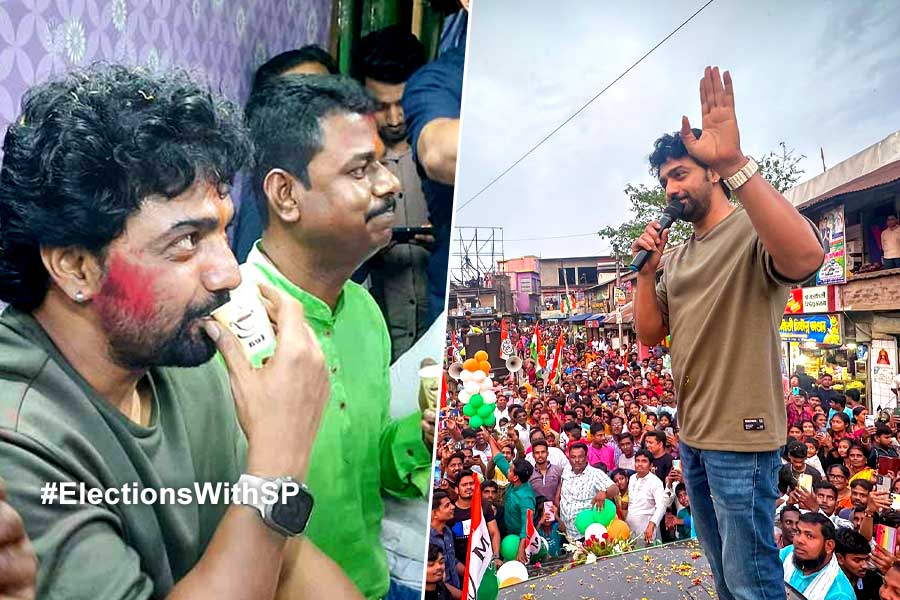 Dev at local teac shop with party tmc workers during campaign in Daspur