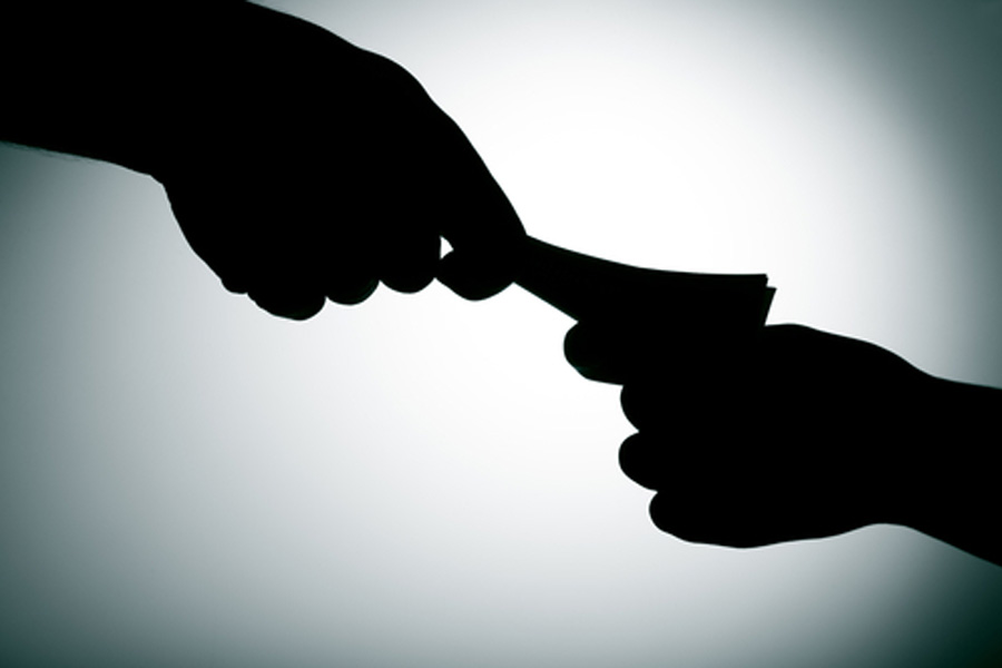 Gujarat officials accept bribes in EMI