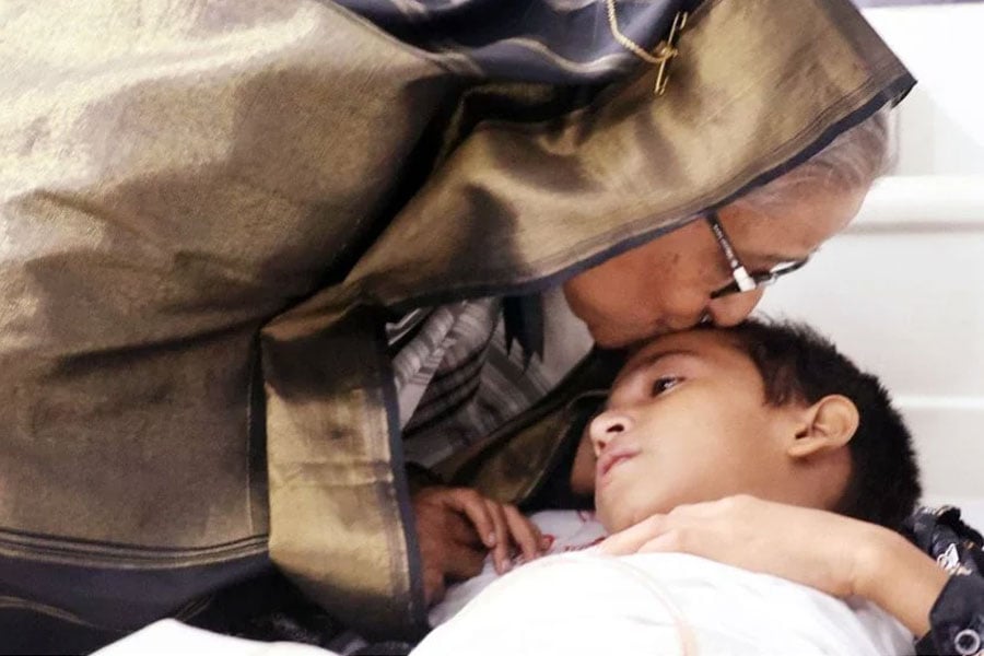Bangladesh PM Sheikh Hasina cries after meeting child who got injured during unrest in hospital