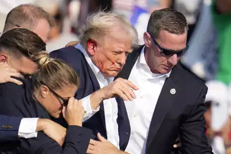 Donald Trump escapes fatality by mili second