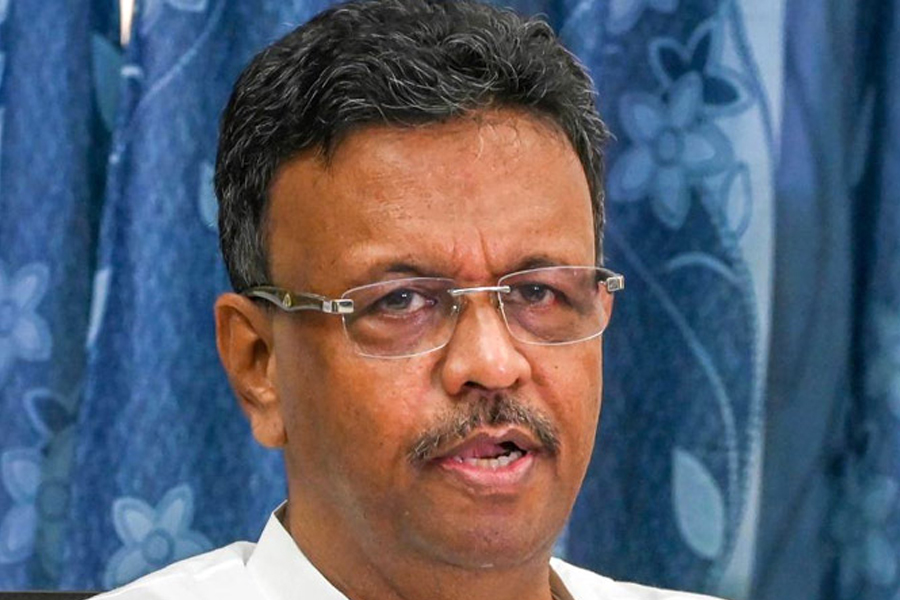 Firhad Hakim at the house of the protester killed in Ekbalpur